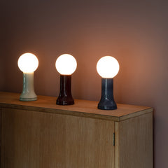How to Use a Table Lamp to Make a Home Office Feel Less Harsh and More Lived In