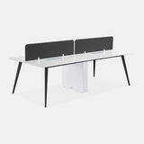 Urbanica 4-person quad office workstation desk with sleek privacy panels, white tabletop, and black tapered legs – modern team workspace solution