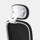 Close-up rear view of Urbanica Ergonomic Muse Chair Headrest in black mesh with a sleek white frame, designed for adjustable neck support and breathable comfort.